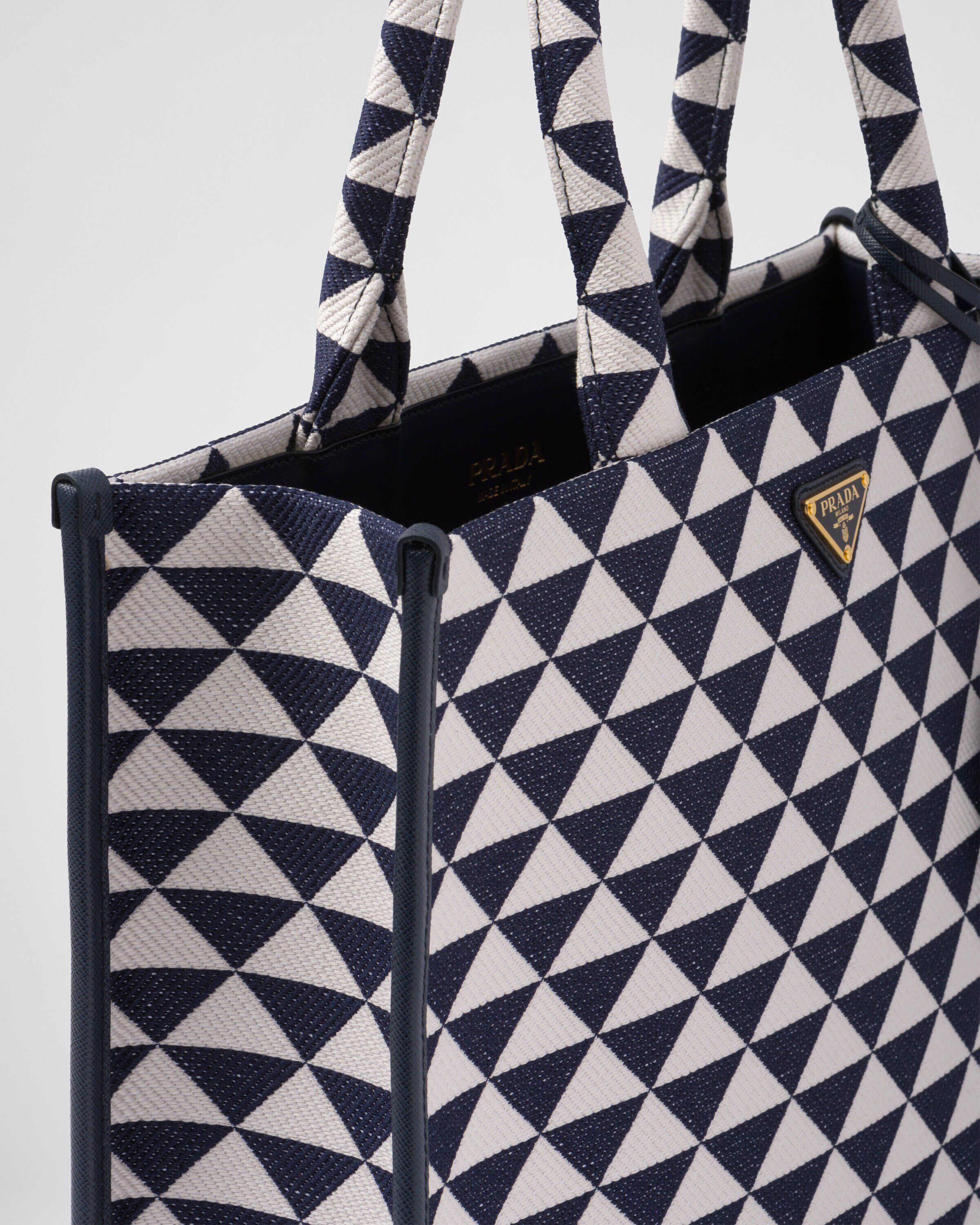 Large Prada Symbole embroidered fabric handbag