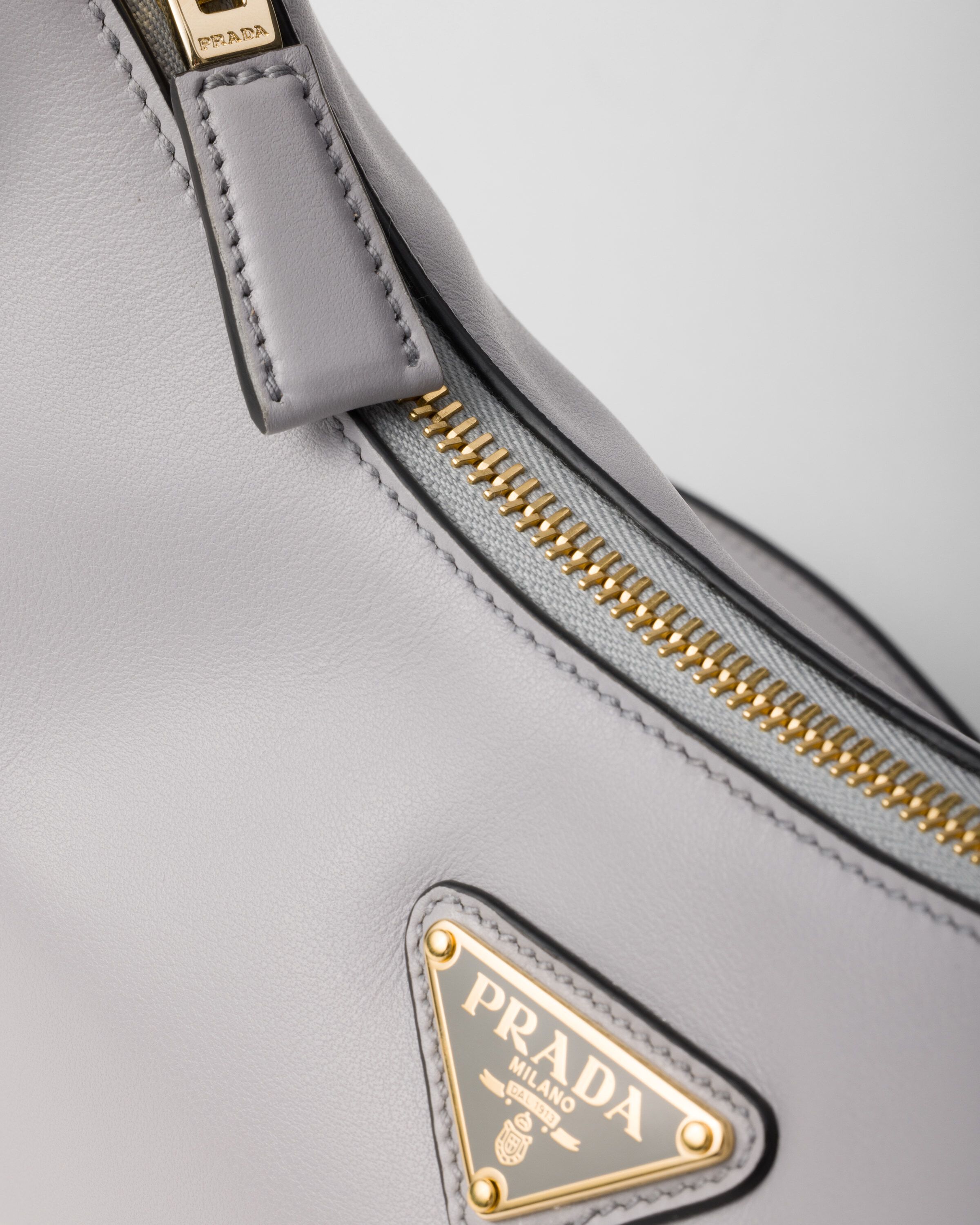 Prada Prada Arqué small leather shoulder bag Women | Heathrow