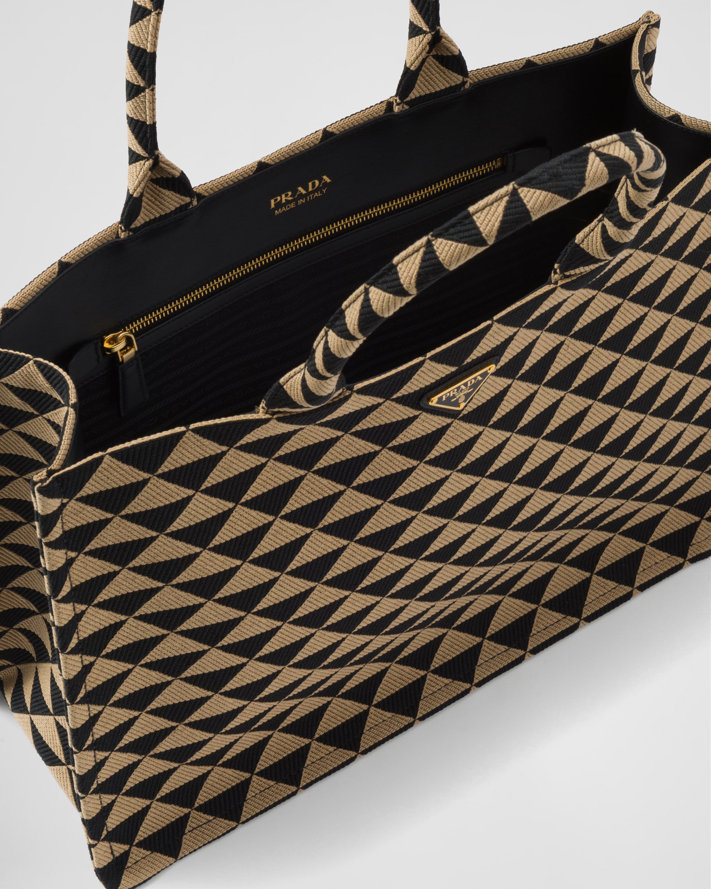 Prada Prada Symbole embroidered fabric tote bag Tote Heathrow Reserve Collect