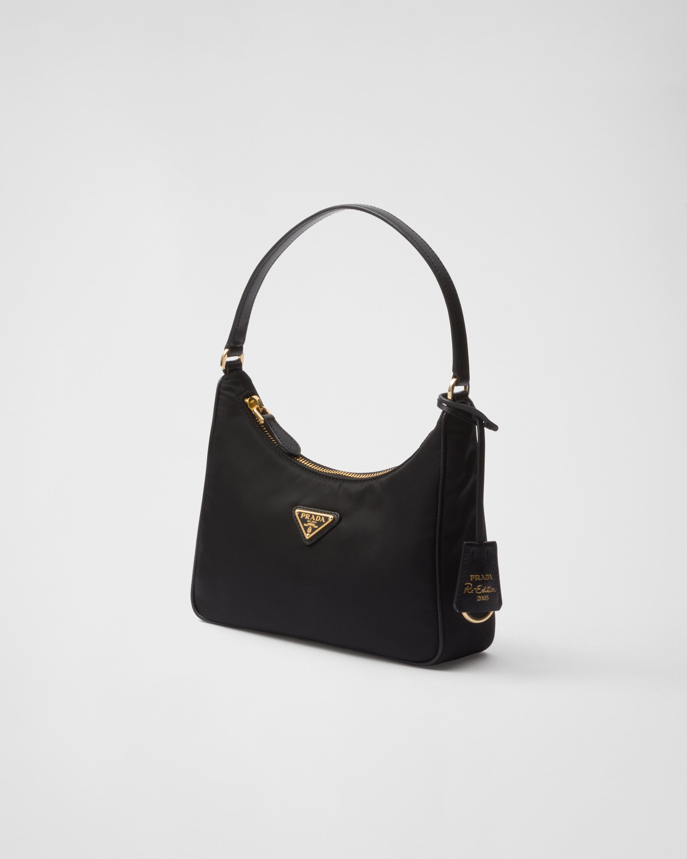 Prada Prada Re Edition 2005 Re Nylon and Saffiano mini bag Women Heathrow Reserve Collect