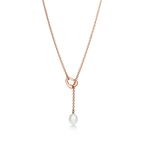 Elsa Peretti® Open Heart lariat in 18k rose gold with a freshwater pearl.
