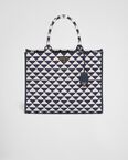 Large Prada Symbole embroidered fabric handbag