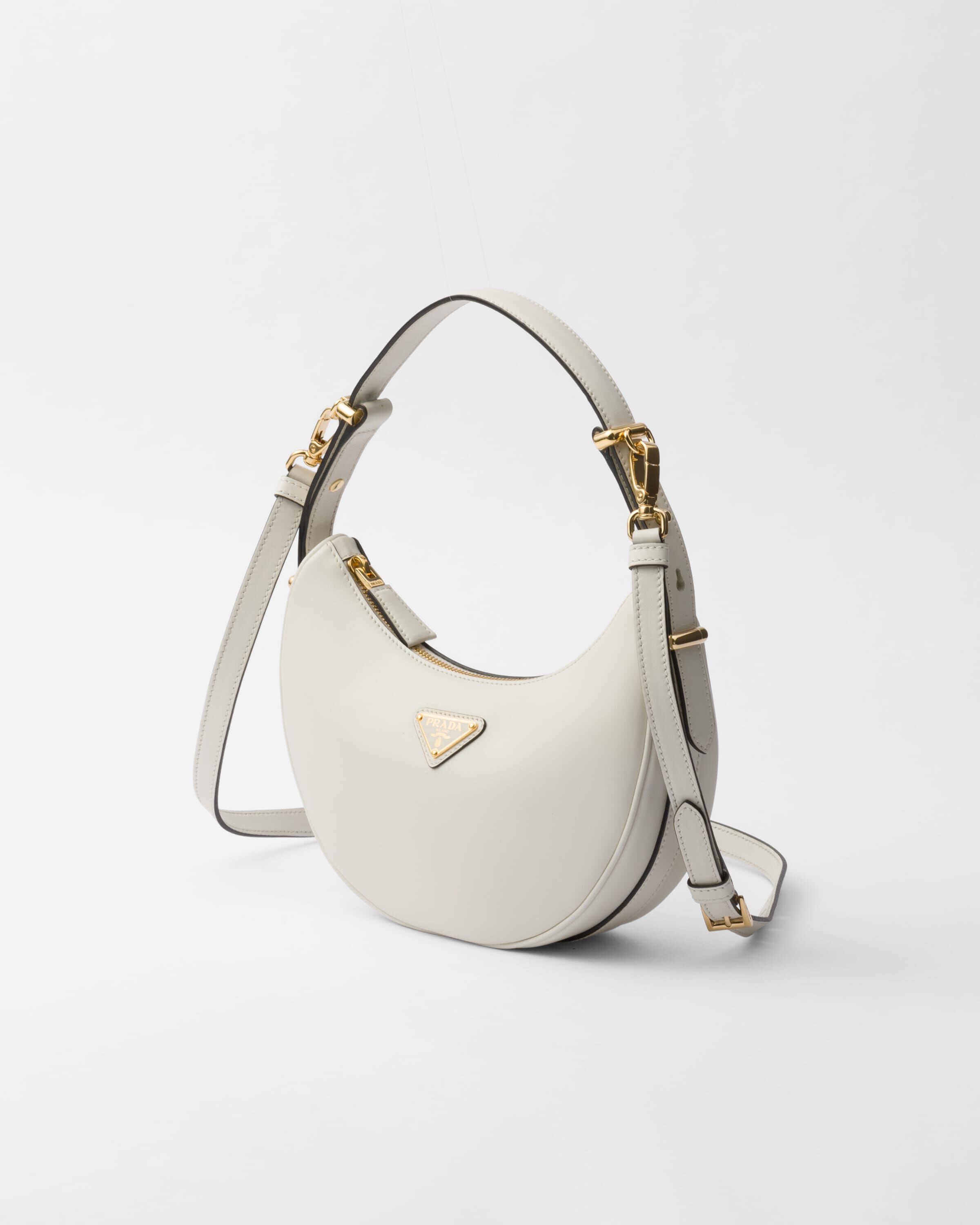 Prada Prada Arqué small leather shoulder bag Women | Heathrow