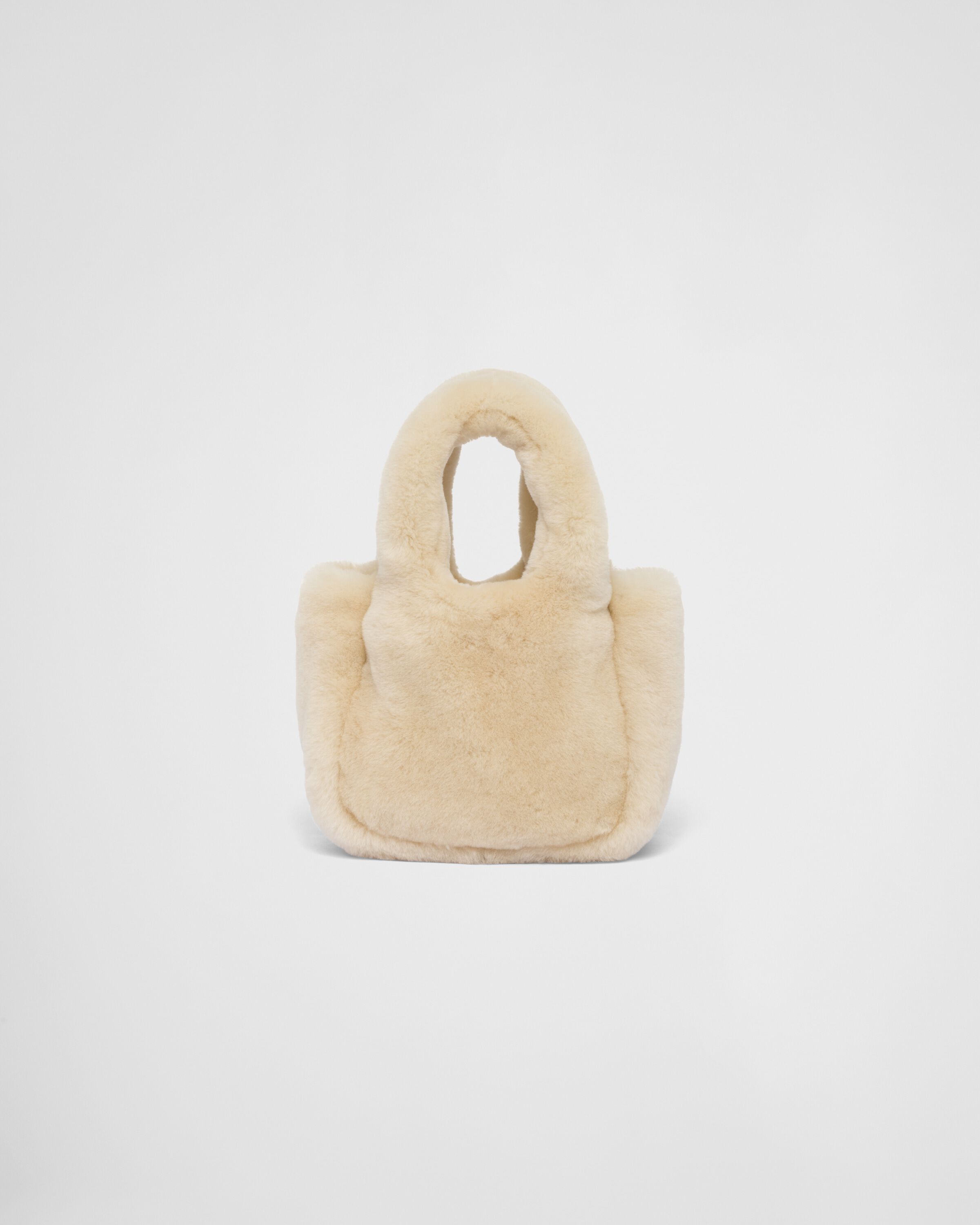 Prada Shearling mini handbag Women | Heathrow Reserve & Collect