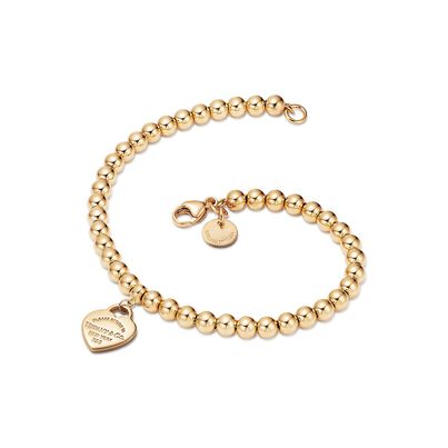 Return to Tiffany&trade; mini heart tag on a bead bracelet in 18k gold, extra small, , hi-res