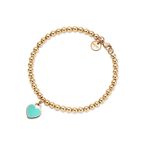Return to Tiffany™ mini heart tag on a bead bracelet in 18k gold, extra small