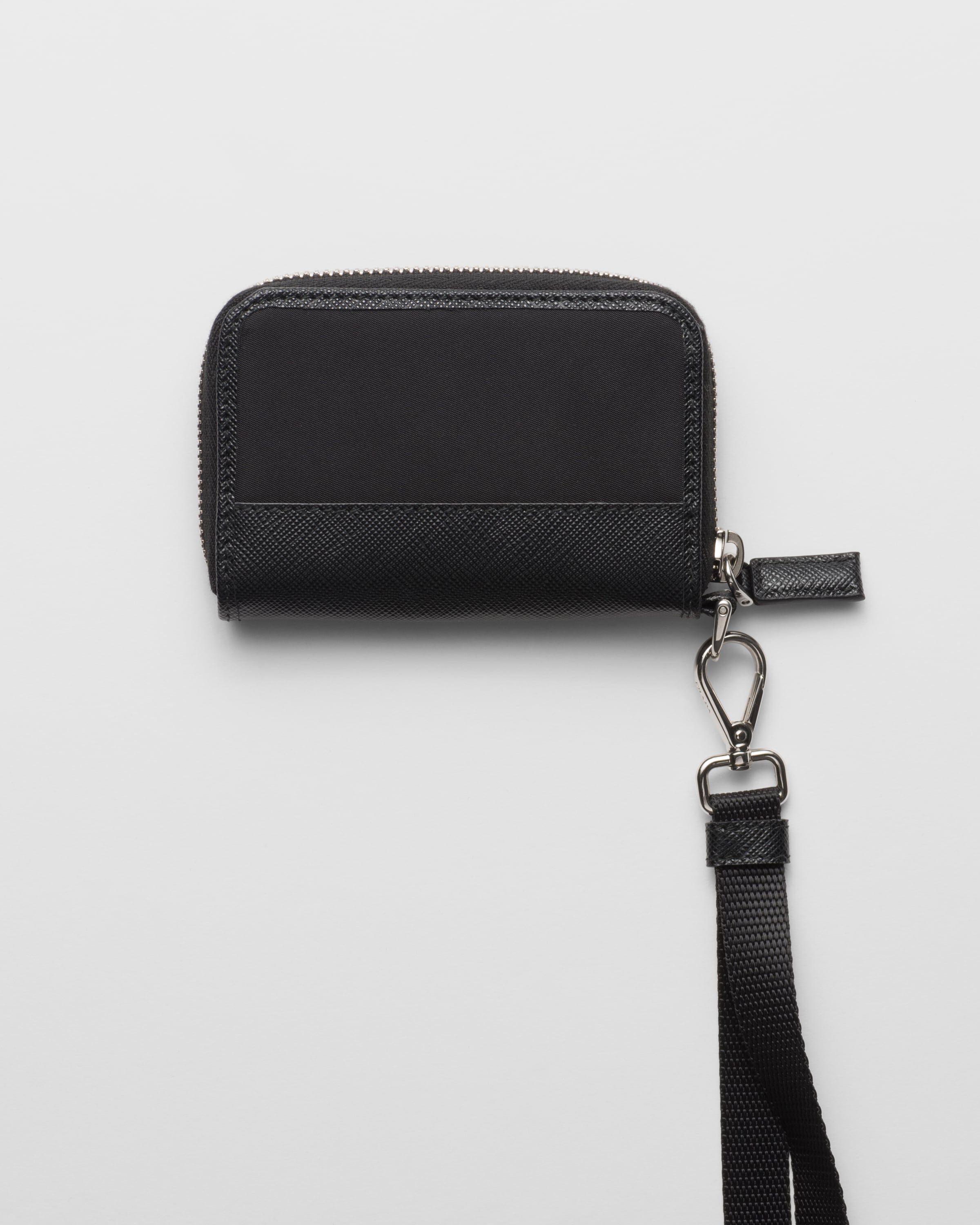 Prada coin purse price hot sale