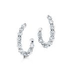 Inside-out hoop earrings of diamonds in platinum.