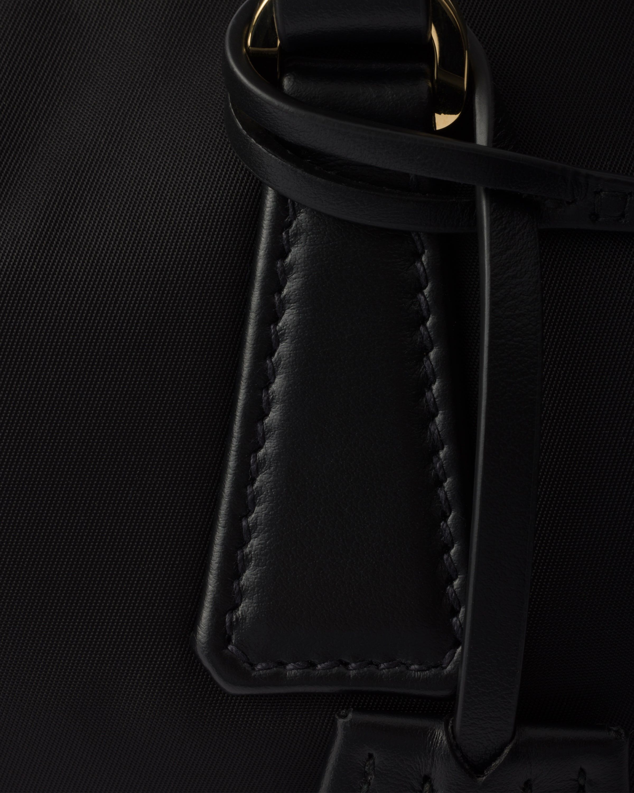 Prada Re Nylon and leather medium top handle bag with padlock Top Handle Heathrow Reserve Collect