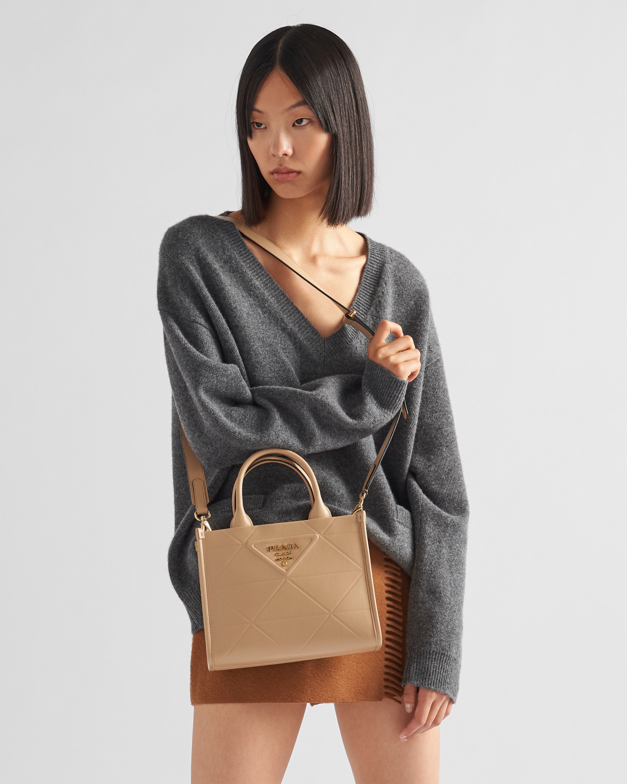 Prada Mini Prada Symbole leather bag with stitching Tote Heathrow Reserve Collect