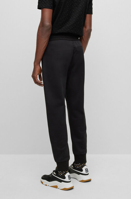 Cotton-terry tracksuit bottoms with monogram-filled logo, , hi-res