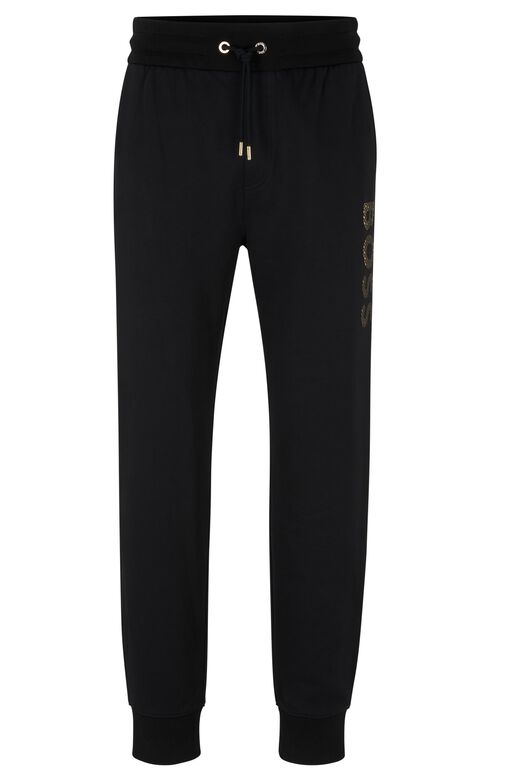 Cotton-terry tracksuit bottoms with monogram-filled logo, , hi-res