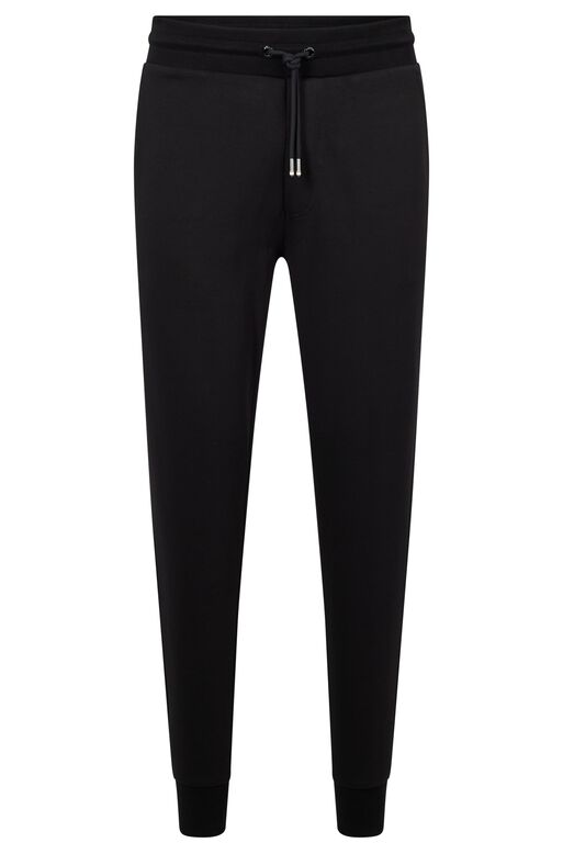 Organic-cotton tracksuit bottoms with rubber-print logo, , hi-res