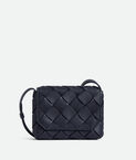 Cross-body bag in grained Intreccio leather.
