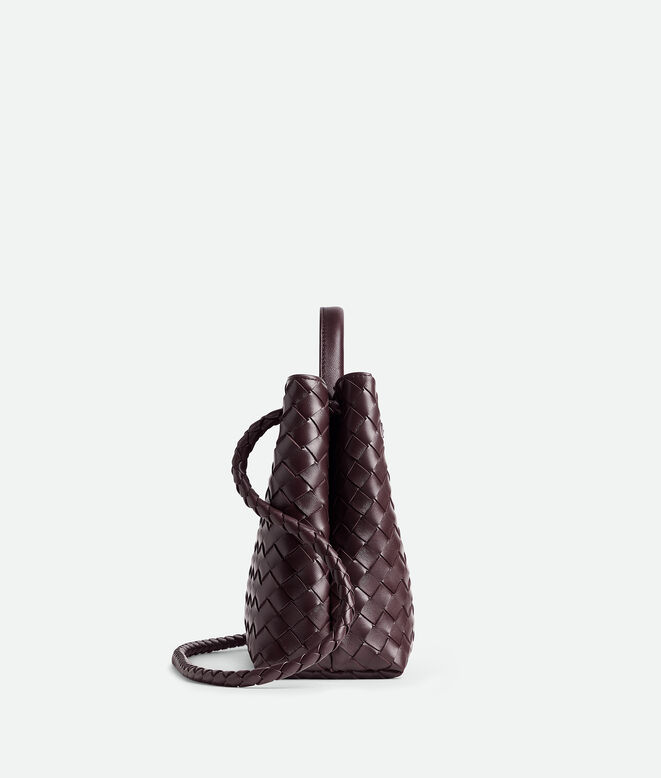 Top handle bag in supple Intrecciato leather with signature knot detail and sliding cross-body strap., , hi-res