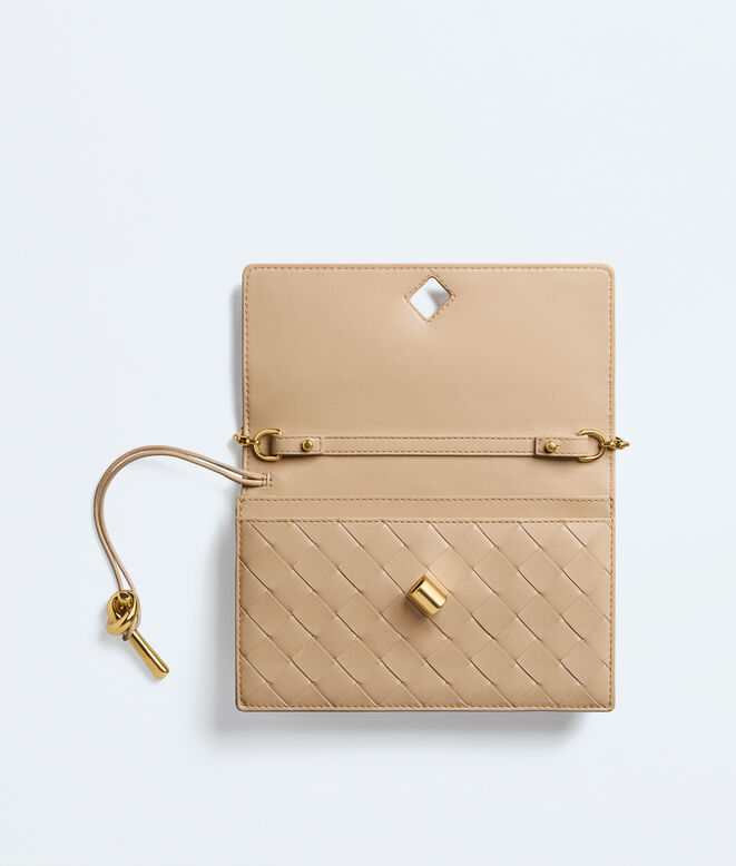 Pouch in Intrecciato nappa leather with signature knot closure and metal chain., , hi-res