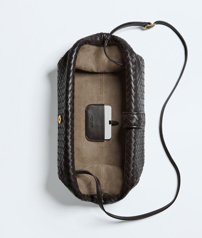 Clutch with elongated silhouette in Intrecciato leather, featuring an adjustable shoulder strap., , hi-res