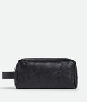 Pouch in smooth and Intrecciato silky calf leather with handle, featuring an archival all-over dégradé effect.