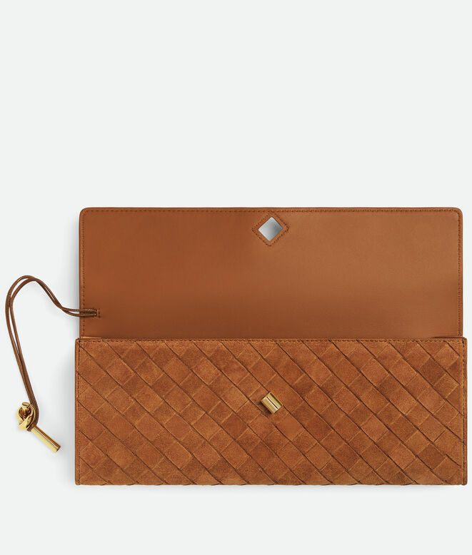 Top handle clutch in Intrecciato suede with signature knot closure., , hi-res