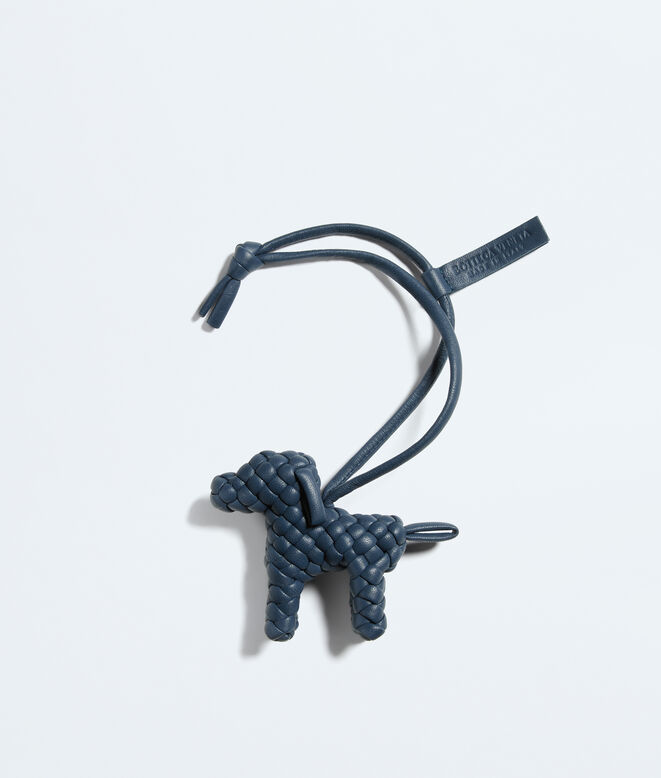 Charm realised in Intreccio nappa leather with dog shape, featuring a leather lanyard., , hi-res