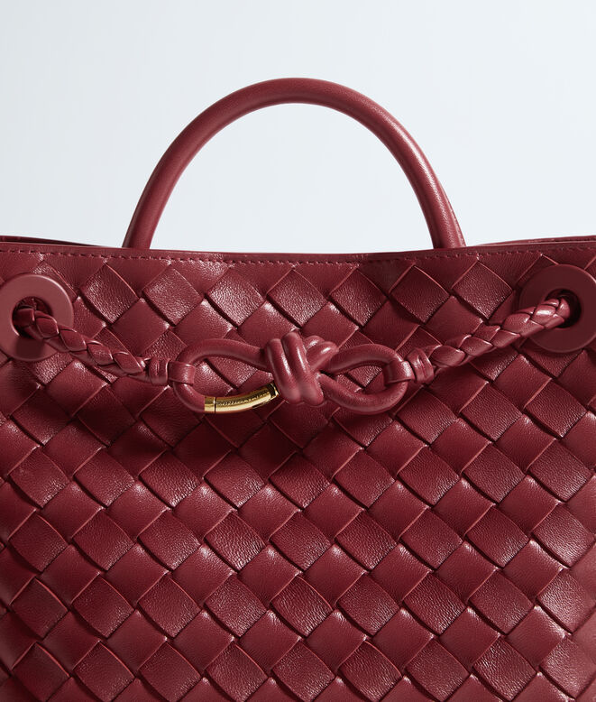 Top handle bag in supple Intrecciato leather, featuring a smooth leather covered signature knot detail and sliding cross-body strap., , hi-res