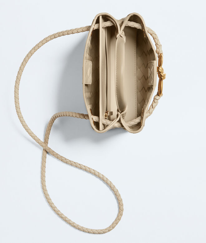 Top handle bag in supple Intrecciato leather with signature knot detail and sliding cross-body strap., , hi-res