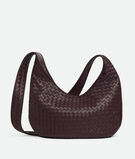 Cross-body bag with rounded shape in Intrecciato nappa fluffy. , , hi-res