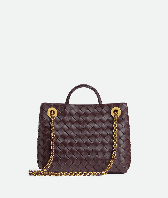 Top handle bag in supple Intrecciato leather with signature knot detail and tubular leather braided metal chain., , hi-res
