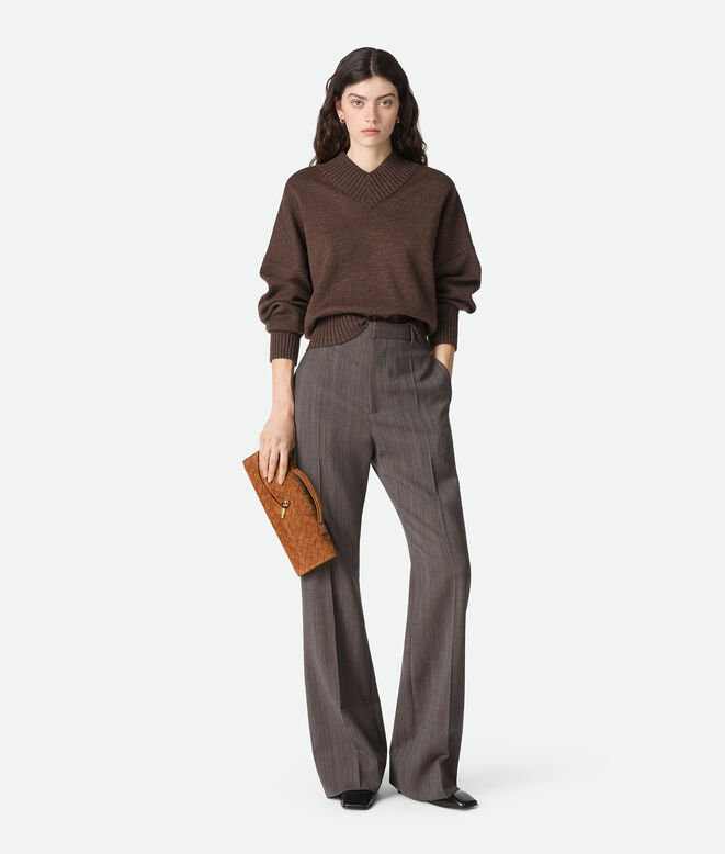 Top handle clutch in Intrecciato suede with signature knot closure., , hi-res