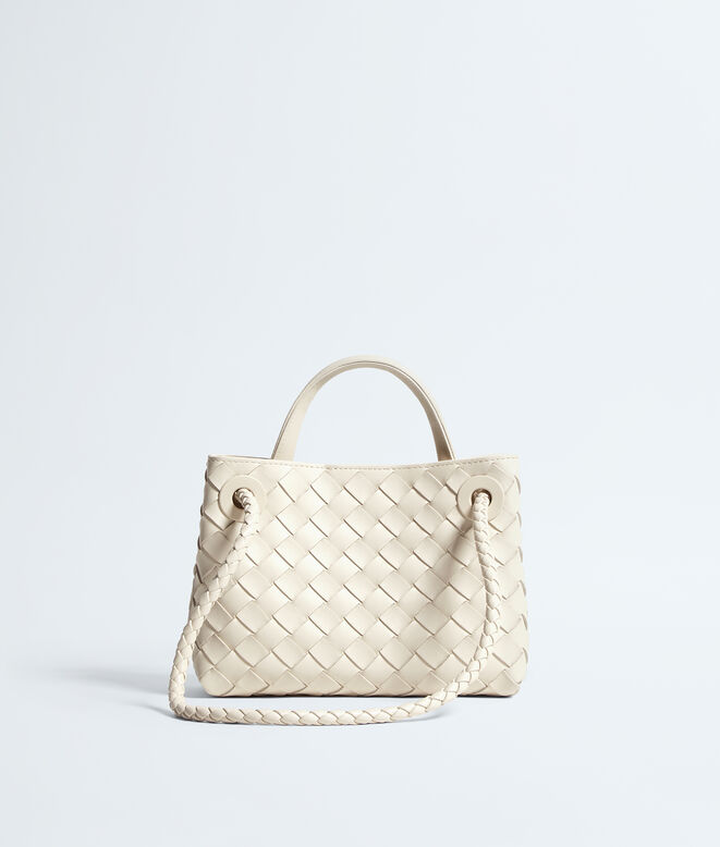 Top handle bag in supple Intrecciato leather with signature knot detail and sliding cross-body strap., , hi-res