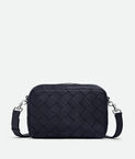 Cross-body bag in grained Intrecciato leather with detachable strap.