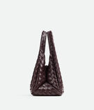 Shoulder bag with archival silhouette in supple Intrecciato leather with tie closure., , hi-res