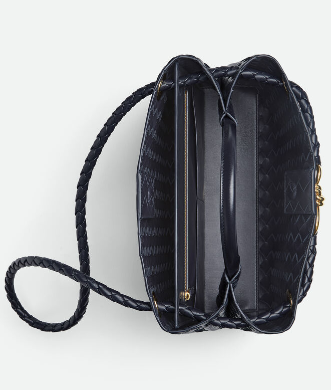 Top handle bag in Intrecciato leather with signature knot detail and sliding cross-body strap., , hi-res