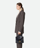 Top handle bag in silky calf leather with two-way flap and signature knot detail. Features a hidden hook closure, allowing the flap to be closed in the front or attached to the interior Intrecciato pocket., , hi-res