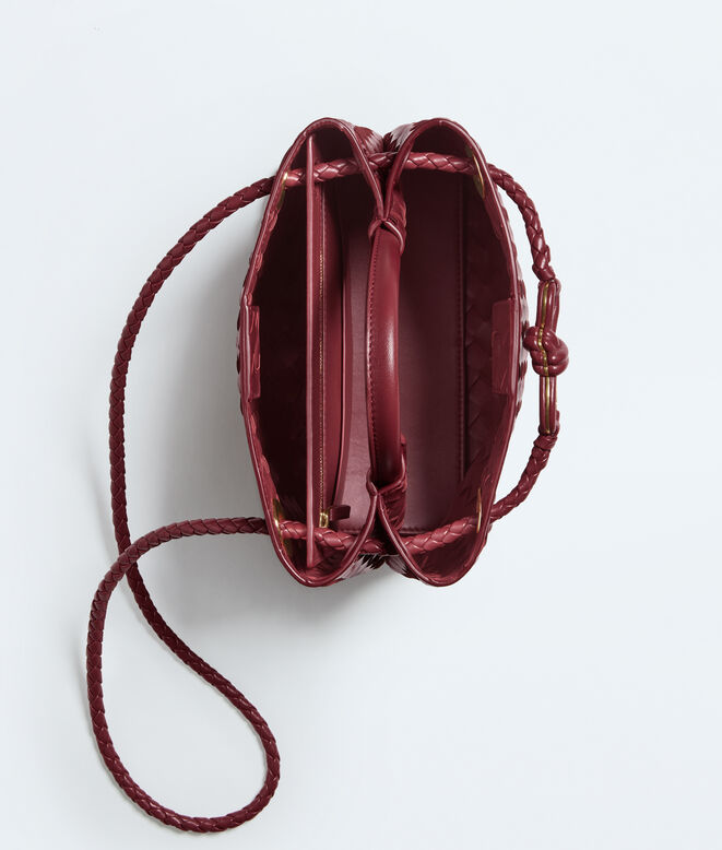 Top handle bag in supple Intrecciato leather, featuring a smooth leather covered signature knot detail and sliding cross-body strap., , hi-res