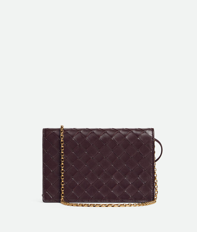Pouch in Intrecciato nappa leather with signature knot closure and metal chain., , hi-res
