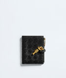 Small bi-fold wallet in Intrecciato nappa leather with signature knot detail. , , hi-res