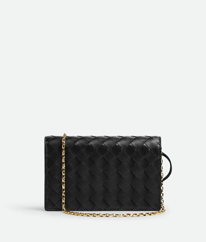 Pouch in Intrecciato nappa leather with signature knot closure and metal chain., , hi-res