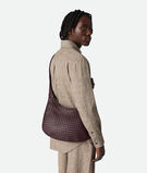 Cross-body bag with rounded shape in Intrecciato nappa fluffy. , , hi-res