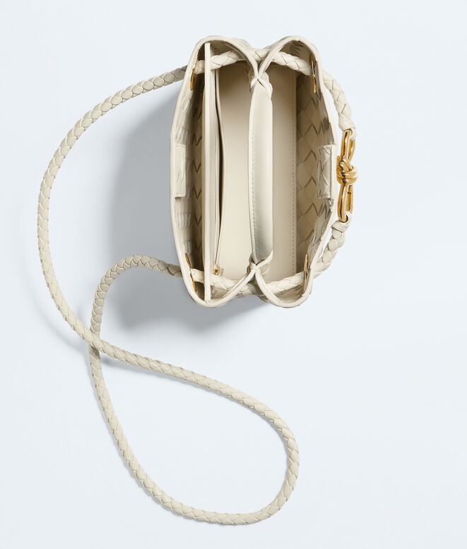 Top handle bag in supple Intrecciato leather with signature knot detail and sliding cross-body strap., , hi-res