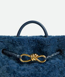 Top handle bag in merino shearling with denim effect. Featuring signature knot detail and sliding cross-body strap., , hi-res