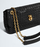 Shoulder bag in Intrecciato leather with malleable memory flap, sculptural knot closure and sliding cross-body chain, featuring a leather shoulder pad., , hi-res