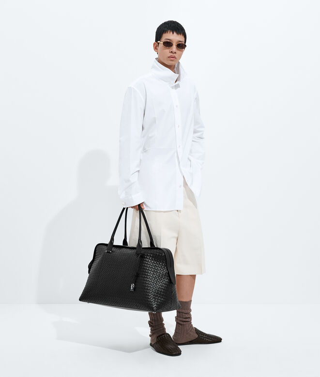 Weekender made with supple Intrecciato craftsmanship in nappa leather, featuring a detachable leather lanyard with lock., , hi-res