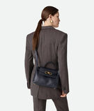 Top handle bag in silky calf leather with two-way flap and signature knot detail. Features a hidden hook closure, allowing the flap to be closed in the front or attached to the interior Intrecciato pocket., , hi-res