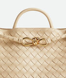 Top handle bag in supple Intrecciato leather with signature knot detail and sliding cross-body strap., , hi-res