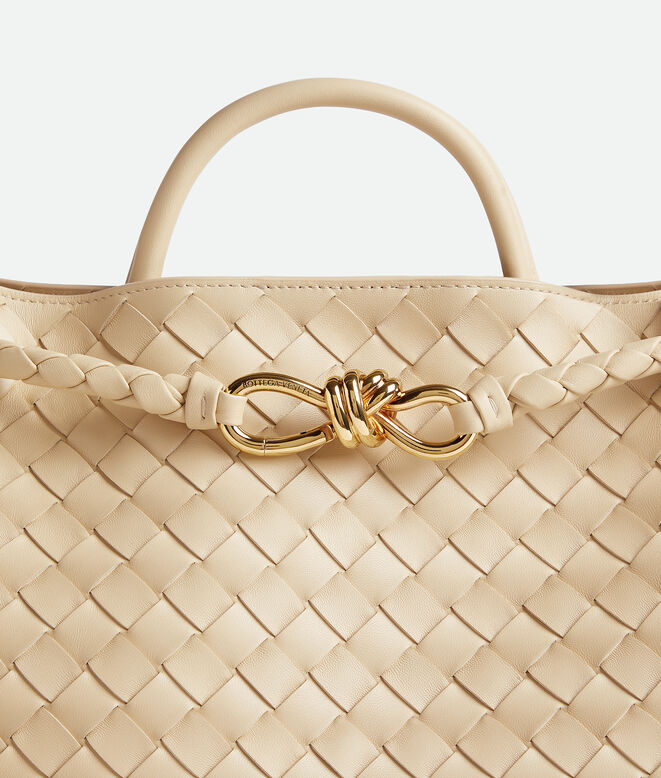 Top handle bag in supple Intrecciato leather with signature knot detail and sliding cross-body strap., , hi-res
