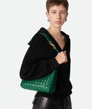 Top handle bag in supple Intrecciato leather with signature knot detail and sliding cross-body strap., , hi-res