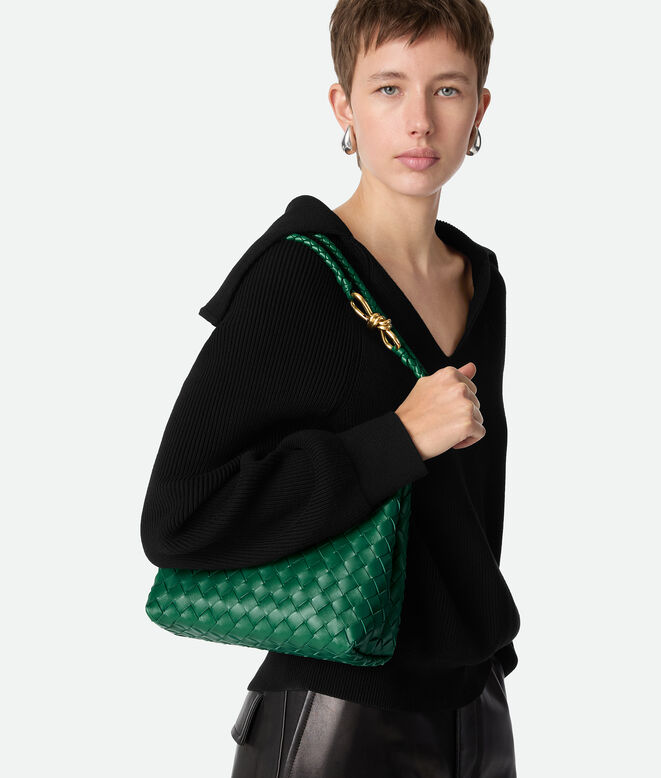 Top handle bag in supple Intrecciato leather with signature knot detail and sliding cross-body strap., , hi-res