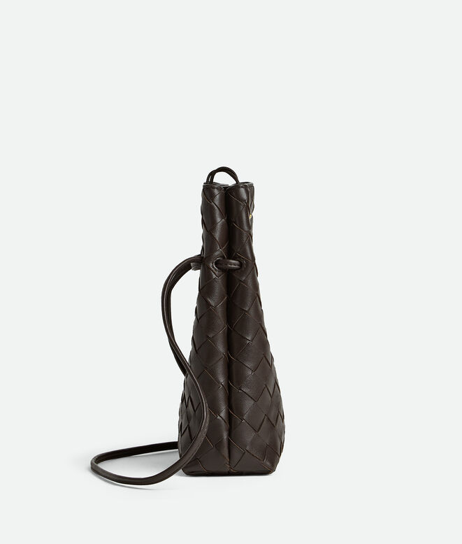 Phone pouch in Intrecciato nappa leather with signature knot closure and sliding strap., , hi-res