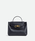 Top handle bag in silky calf leather with two-way flap and signature knot detail. Features a hidden hook closure, allowing the flap to be closed in the front or attached to the interior Intrecciato pocket., , hi-res